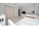 Cozy bedroom with a closet, built-in dresser, and a single bed at 8108 Via Bella Notte, Orlando, FL 32836