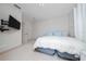 Bedroom featuring a large bed, neutral decor, and ample natural light at 8108 Via Bella Notte, Orlando, FL 32836
