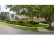 Gorgeous home boasts lush landscaping, mature trees, and an inviting curb appeal at 8108 Via Bella Notte, Orlando, FL 32836