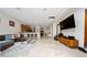 Open-concept living area seamlessly blends the kitchen and living room perfect for entertaining guests at 8108 Via Bella Notte, Orlando, FL 32836