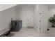 This stylish laundry room offers a modern washer and dryer, and tile flooring at 10108 Sunnifa Aly, Orlando, FL 32832