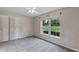 Bedroom with a closet, window with natural light, neutral walls, and plush gray carpet, creates a comfortable atmosphere at 1071 Deer Run Dr, Winter Springs, FL 32708