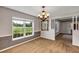 This living room features neutral walls, carpet floors, and decorative chair rail at 1071 Deer Run Dr, Winter Springs, FL 32708
