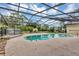 Inviting screened-in pool area with a deck, ideal for leisure and entertaining at 1071 Deer Run Dr, Winter Springs, FL 32708