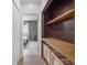 Walk-in closet featuring built-in shelves and laundry baskets at 1105 Appleton Ave, Orlando, FL 32806