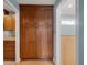 Hallway with storage cabinets and views of the kitchen and bathroom at 1105 Appleton Ave, Orlando, FL 32806