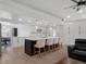 Spacious kitchen featuring a center island with seating and modern appliances at 1105 Appleton Ave, Orlando, FL 32806