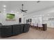 Bright, open-concept living room and kitchen area with modern finishes and lots of natural light at 1105 Appleton Ave, Orlando, FL 32806