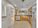 Functional kitchen with stainless steel appliances, wood cabinets, and tile flooring at 1117 Park Green Pl, Winter Park, FL 32789