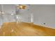 Bright living room with hardwood floors and neutral walls, offering a versatile space at 1117 Park Green Pl, Winter Park, FL 32789