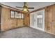 Covered patio with tile flooring, wood paneling, and doors to the outside at 1117 Park Green Pl, Winter Park, FL 32789