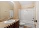Bathroom featuring a combination tub and shower, toilet, sink, vanity, and a large mirror at 1210 San Jacinto Cir, Sanford, FL 32771