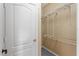 A large walk-in closet offers ample storage with its built-in shelving system, providing a practical solution for organization at 1210 San Jacinto Cir, Sanford, FL 32771