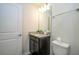 The single vanity bathroom offers granite counters and functional design at 1292 Blue Island Dr, Clermont, FL 34714