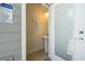 Poolside bathroom with modern sink and natural light at 1292 Blue Island Dr, Clermont, FL 34714