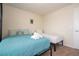 Bedroom featuring two beds, a window, and cartoon wall art at 1292 Blue Island Dr, Clermont, FL 34714