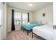 Bedroom featuring two twin beds with view from the window at 1292 Blue Island Dr, Clermont, FL 34714
