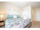 Bright bedroom with closet and connected bathroom includes a double vanity at 1292 Blue Island Dr, Clermont, FL 34714