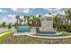Windsor Cay Resort entrance with sign, fountain, landscaping, and decorative architecture at 1292 Blue Island Dr, Clermont, FL 34714