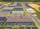 Townhomes with private screened in pools, green lawns, and well-manicured landscaping at 1292 Blue Island Dr, Clermont, FL 34714