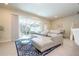 Comfortable living room with stylish furniture, a sliding glass door leading to an outdoor patio at 1292 Blue Island Dr, Clermont, FL 34714