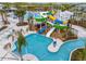 Inviting community pool area with water slides and ample space for relaxation and recreation at 1292 Blue Island Dr, Clermont, FL 34714