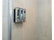 Modern shower with built-in dispenser and tiled walls at 1292 Blue Island Dr, Clermont, FL 34714