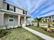 Inviting home exterior with manicured lawn and fresh landscaping at 15579 Water Spring Blvd, Winter Garden, FL 34787