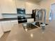 Close-up of kitchen island featuring stainless steel faucet and sink at 15579 Water Spring Blvd, Winter Garden, FL 34787