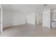 Spacious living area with neutral tile flooring, offering a blank canvas for personalization at 1580 Gardiner St, Haines City, FL 33844