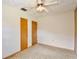 Bedroom featuring neutral walls and closet space at 1607 Lindale Ave, Eustis, FL 32726