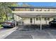 Assigned covered parking space, providing protection for vehicles and easy access to the building at 210 Magnolia Rd # 214, Maitland, FL 32751