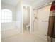 Bathroom featuring a soaking tub, a walk-in shower, and a separate toilet room at 2205 Wyndam Way, Kissimmee, FL 34743