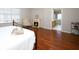 Bedroom featuring an iron bed frame, fireplace, and an ensuite bathroom at 2205 Wyndam Way, Kissimmee, FL 34743