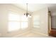 Dining room with natural light coming through large windows at 2205 Wyndam Way, Kissimmee, FL 34743