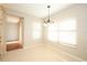 Bright dining area with tiled floors and large windows at 2205 Wyndam Way, Kissimmee, FL 34743