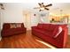Comfortable living room that leads into kitchen area at 2205 Wyndam Way, Kissimmee, FL 34743