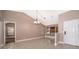 Spacious dining room with tile floors, a chandelier, and an open floor plan at 2223 Fairmont Cir, Orlando, FL 32837