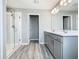 Bathroom featuring double vanity, a glass-enclosed shower, and modern fixtures at 242 White Heron Way, St Cloud, FL 34772
