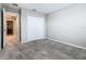 Bedroom with a closet and neutral decor, doorway leading to laundry area at 242 White Heron Way, St Cloud, FL 34772