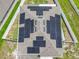 Aerial view of a house roof showcasing efficient solar panel installation for sustainable energy at 242 White Heron Way, St Cloud, FL 34772