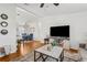 Open-concept living area flows into the dining area, creating a spacious and inviting atmosphere at 25333 Casa Del Lago Ln, Leesburg, FL 34748