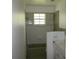 Modest bathroom featuring a shower and a window providing natural light at 305 E Orange St, Altamonte Springs, FL 32701