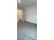 Bedroom with neutral carpet, featuring a walk-in closet with storage and ample space at 3213 Energy Dr, Kissimmee, FL 34747