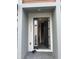 Contemporary home's front entry showcases a modern door and walkway leading inside the house at 3213 Energy Dr, Kissimmee, FL 34747