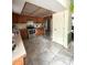 Functional kitchen featuring stainless steel appliances, ample cabinet space, and tile flooring at 34008 S Haines Creek Rd, Leesburg, FL 34788