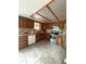Functional kitchen featuring stainless steel appliances, ample cabinet space, and tile flooring at 34008 S Haines Creek Rd, Leesburg, FL 34788