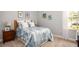 Relaxing bedroom with beach themed decor, soft lighting, and a serene atmosphere at 345 S Sunset Ave, Mascotte, FL 34753