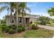 Inviting single-story home with a brick driveway, stone accents, and beautiful landscaping for great curb appeal at 363 Miro Dr, Davenport, FL 33837