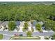This property features a house surrounded by a lush forest, offering privacy and natural beauty at 369 Placid Lake Dr, Sanford, FL 32773